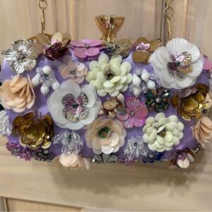 New! Bebe daisy lilac jewel/beaded purse/clutch. Truly unique!